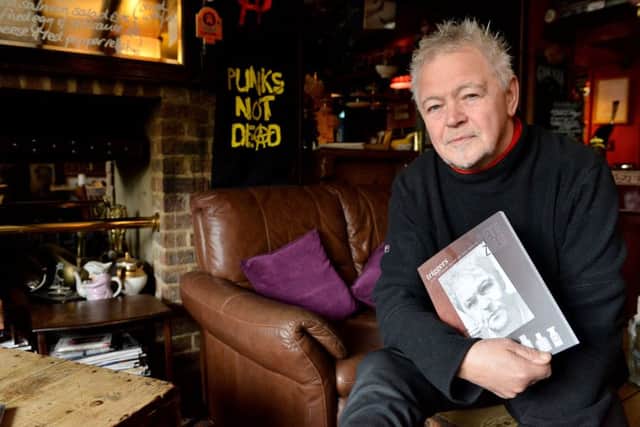 Former Toy Dolls band member and Chef Pete Zulu with his latest book, photographed in The Black Horse Inn, West Boldon. Picture by FRANK REID