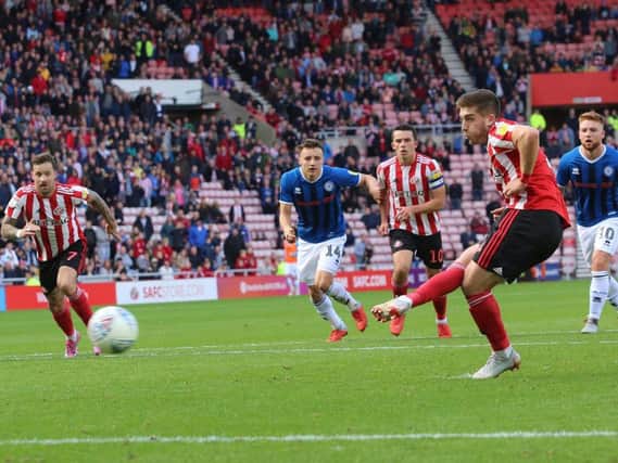 Lynden Gooch scores from the penalty spot for Sunderland in the 4-1 win over Rochdale.