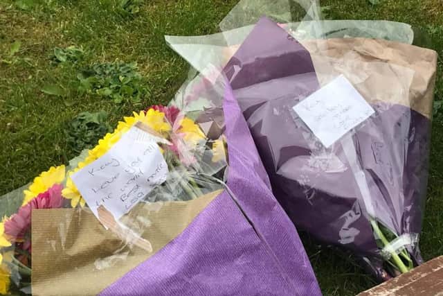 Floral tributes have been left outside the home