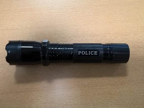 The suspected Taser disguised as a police torch