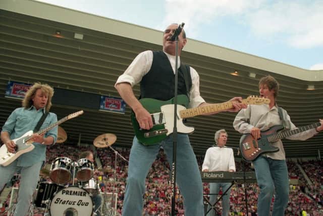 Status Quo with the late Rick Parfitt performing at the opening of the Stadium of Light in 1997