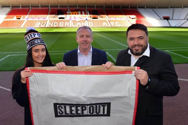 Centrepoint Sleep Out homeless fundraiser at the Stadium of Light. Sunderland AFC Legend and former captain Kevin Ball with Centre Point's fundraiser Jess Sullivan and Martin Gill director of housing (R)