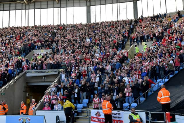 Some of the 5,000-strong Sunderland travelling support inside the Ricoh Arena. Their coaches were targeted outside by Coventry yobs after the game.