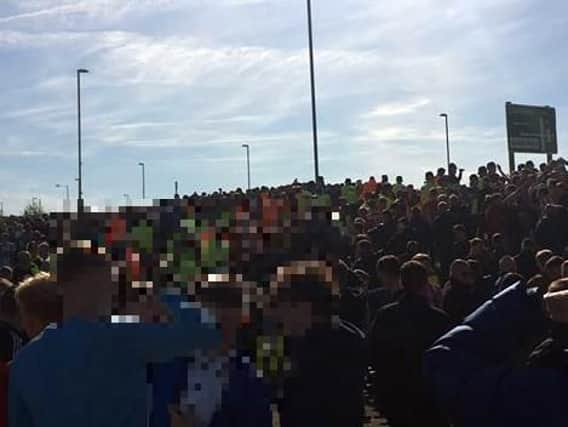 A line of police and stewards are shown keeping Sunderland and Coventry fans apart in this supporter's picture.