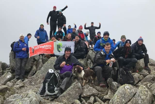 Those taking part in the Strongarm Challenge in memory of Peter Metcalfe after a day of climbing the highest peaks in the Lake District.