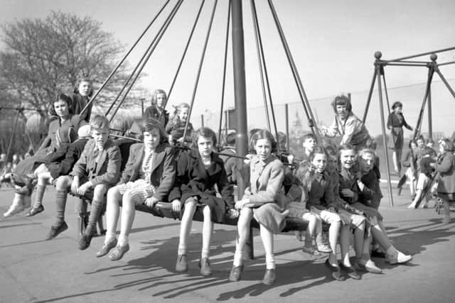 Having fun on these swings are children in Sunderland in the 1950s.