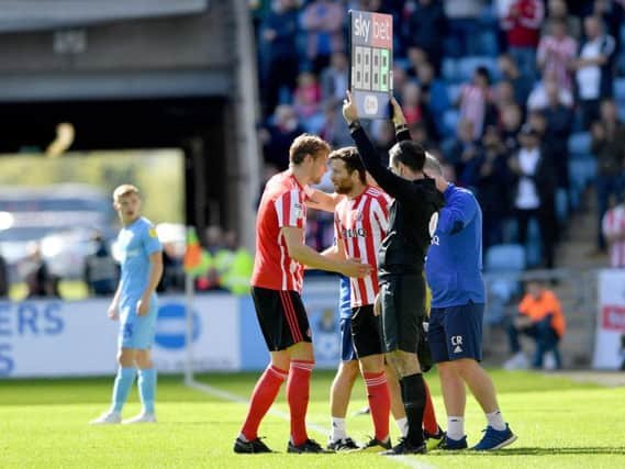 Glenn Loovens is subbed early on against Coventry City.