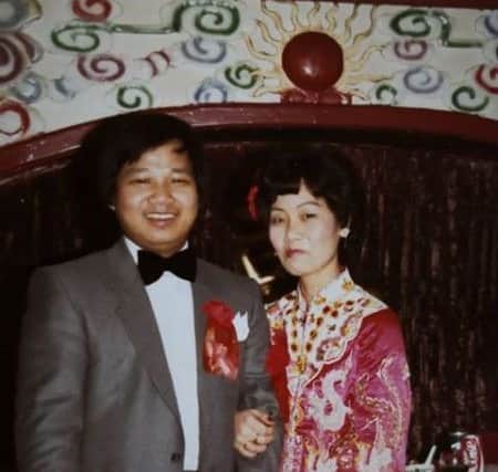 George Ng and wife Peng pictured on their wedding day.
