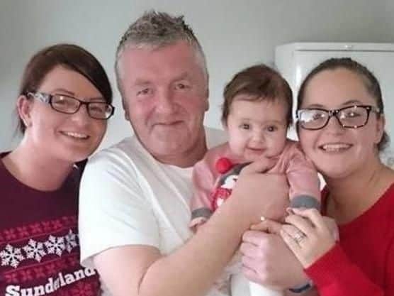 Stewart Anderson pictured holding granddaughter Neve Allcroft, and daughters Kelly Beston, left and Kay Allcroft.