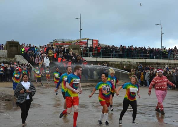 Dippers rush into the sea at last year's event