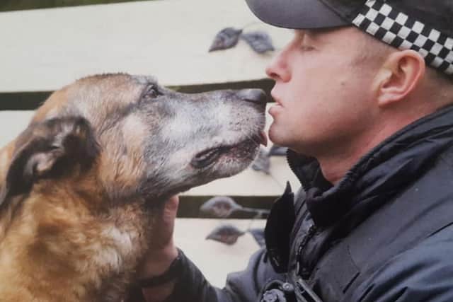 Police dog Louis with his handler Pc Steve Henry.