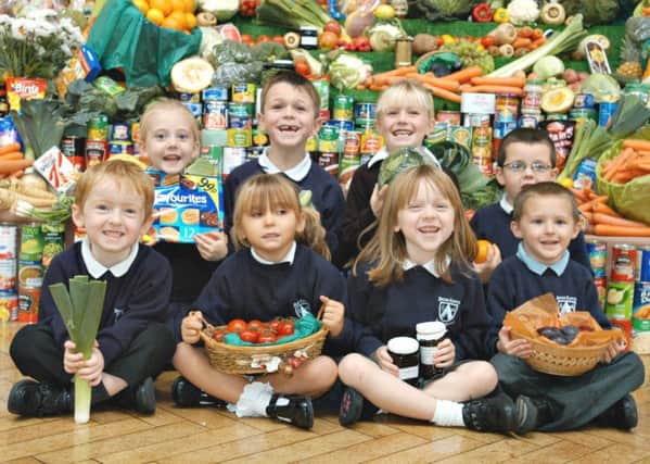 Hetton Lyons Primary School celebrate their harvest festival back in 2005.