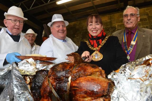 From left Ashley Burland, Derek Moss, Mayor of Sunderland Lynda Scanlan and president Graham McGrath at the roasting of the ox at Houghton Feast.