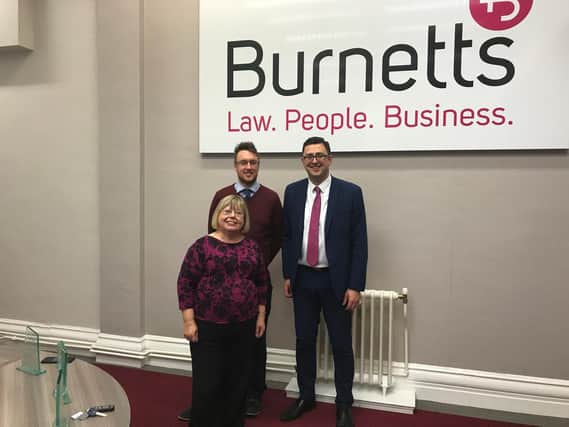 From left, Liz Twist MP, Codey Sharp and Paul Brown (both of Burnetts). Codey suffered a brain injury himself as a teenager and has been working with Paul at Burnetts.