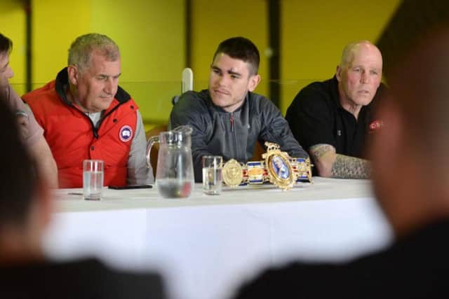 Phil Jeffries (left) sits alongside Tommy Ward (centre) and Neil Fannan (right).