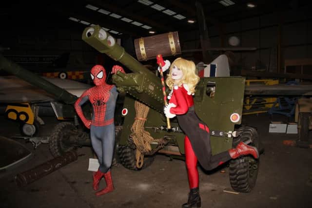 Spider-Man and Harley Quinn check out the North East Land Sea and Air Museum