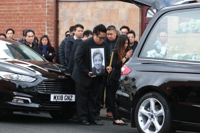 Nigel Ng pauses to pay his respects to his dad George.