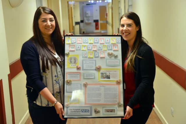 Sunderland Royal Hospital Maternity department Directorate Manager Janet Griffin, right, receives a handmade collage from Steph Archbold as part of her presentation to the team.