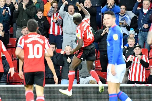 Benji Kimpioka celebrates his goal against Carlisle United