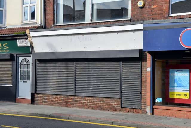 A sign above a shop front in Hylton Road created by Sunderland fans poking fun at supporters of rivals Newcastle United has now been removed.