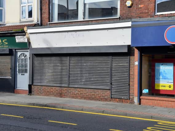 A sign above a shop front in Hylton Road created by Sunderland fans poking fun at supporters of rivals Newcastle United has now been removed.
