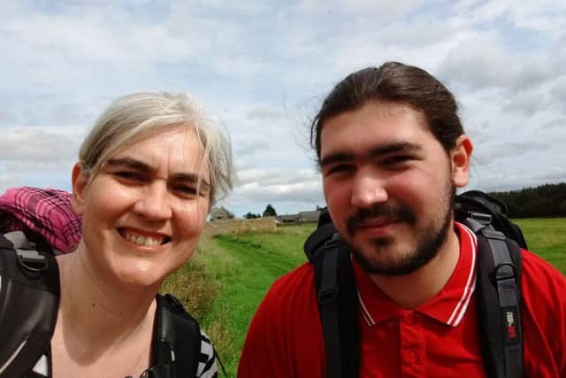 Alison Atkinson-Phillips and son Tijaan while hiking Hadrians Wall earlier this year