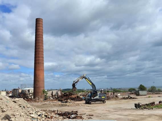 The chimney at the former Edward Thompson paper mill and printworks is set to be demolished later this month