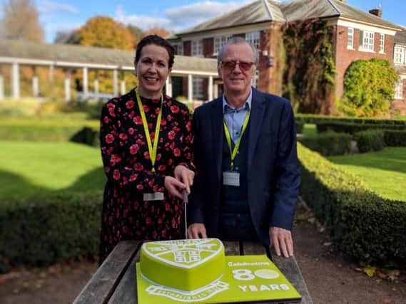 Principal Suzanne Duncan and chairman of governors David Butler cut the Houghall Campus cake.