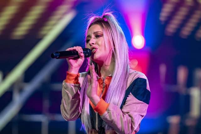 Molly Scott wows judges in live X Factor show.