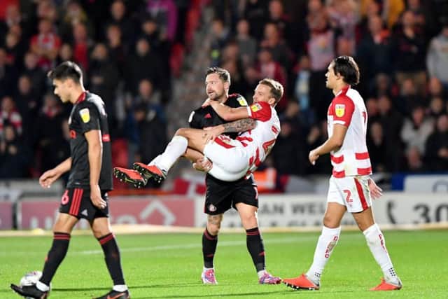 Chris Maguire scored the winner as Sunderland beat Doncaster Rovers