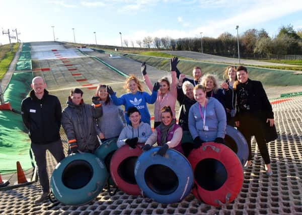 Young Sunderland care-leavers try their hand at snow tubing.