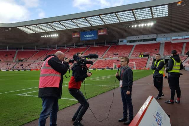 Finlay Anderson on the pitchside at the Stadium of Light.