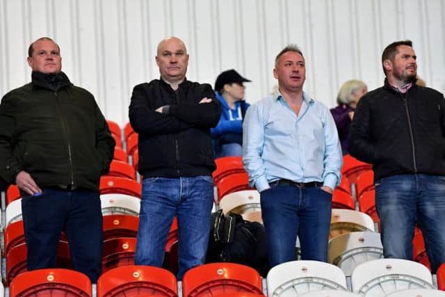 Sunderland owner Stewart Donald in the stands at Doncaster Rovers.