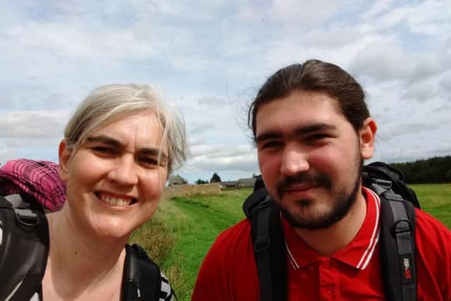 Alison Atkinson-Phillips and son Tijaan while hiking Hadrian's Wall earlier this year