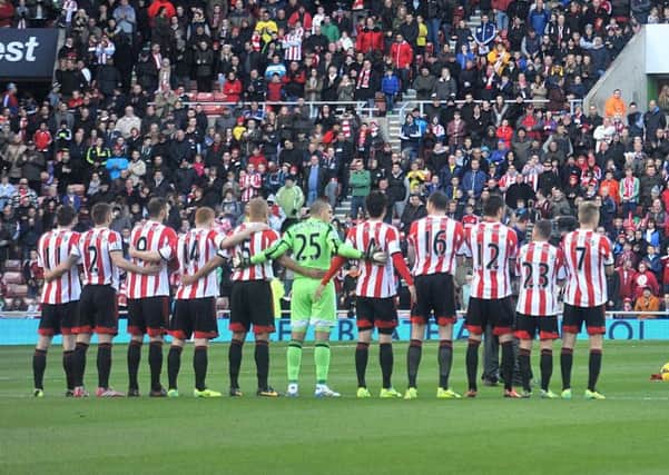 Sunderland players honour the Remembrance silence in 2013