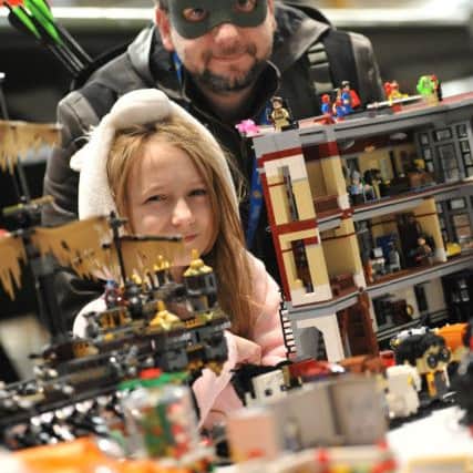 Kendra Theaker and her dad Kevin displaying Lego at Cosplotion held at North East Land, Sea and Air Museum, Washington.