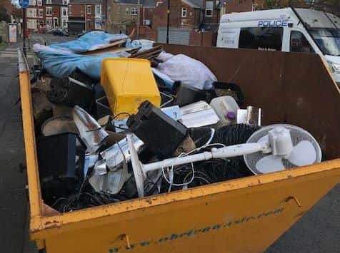 Kit cleared from the house was put into a skip outside the house. Photo by Northumbria Police.
