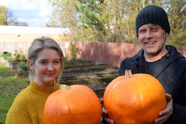 South Hylton Primary Academy receive pumpkins from the community after vandals destroyed the school display. Darrin Carlise hands over the pumpkins to teacher Jessica Maughan