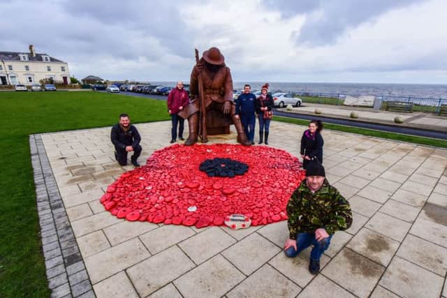 Volunteers pictured in 2016 with painted stones from the beach at Seaham and made a poppy next to the Tommy statue, left to right Andrew Harrison, Philip Ridley, Dave Routlledge, Tracy Spencer, Alex Tinkler and Dave McKenna.