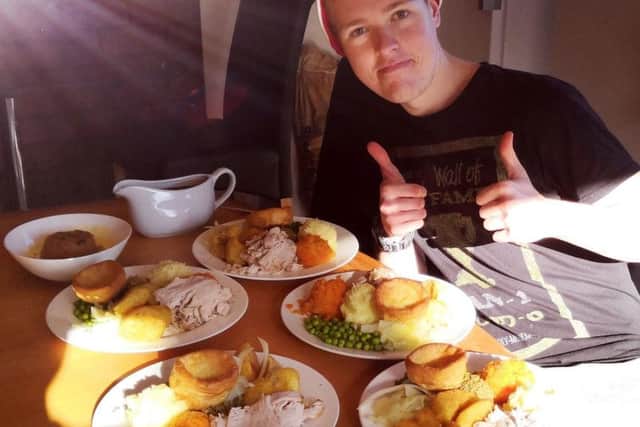 Kyle getting ready to take on the Christmas dinner challenge. Picture: Kyle Gibson.