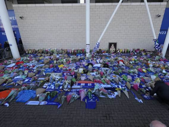 Floral tributes outside the King Power Stadium today