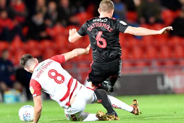 Lee Cattermole goes in for a tackle against Doncaster.