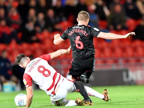 Lee Cattermole goes in for a tackle against Doncaster.