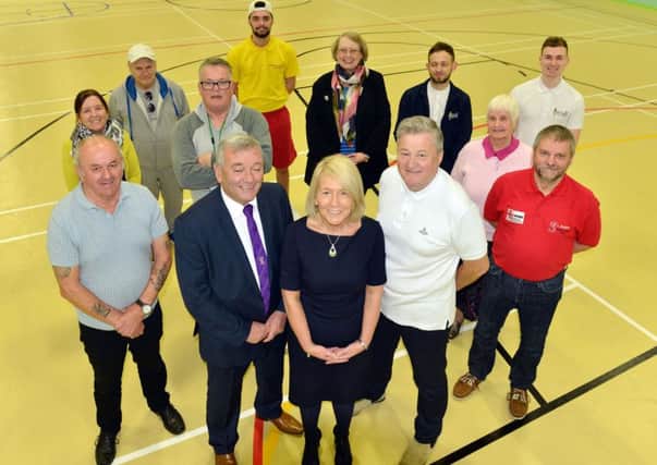 (Front centre) Manager of Boldon Community Association Susan Topping with (left) John Topping of Durham County FA and Colin Dagg of Keep Active NE with fellow funding supporters in the refurbished Sports Hall. Picture by FRANK REID