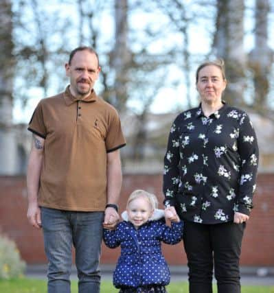 Slimmers Lee Walt and partner Fiona Williams, with their daughter Jessica.