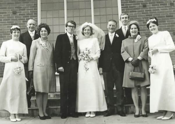 Sandy, Maureen and family, with bridesmaids and best man at their 1970 wedding.
