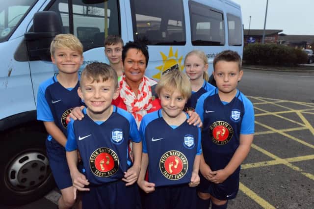 Charity champion Julie Reay has sponsored Southwick Community School  football team with new kit