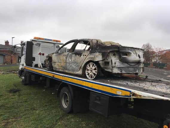 A burnt out car on the back of a recovery truck following the blazes started in Cato Street, Southwick. Photo by BBC Newcastle.