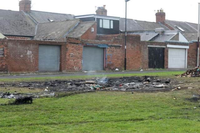 The aftermath of the bonfire earlier on today as smoke continued to rise from the embers earlier on today.