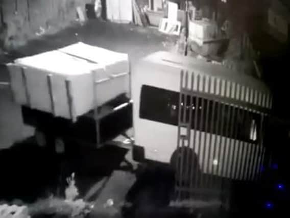 CCTV footage of the hot tub being stolen.